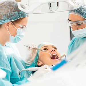 Patient undergoing dental implant surgery